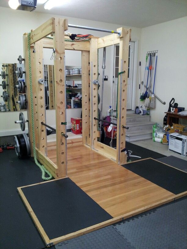I don't even know what to say about this squat rack... neat? crazy? DIY Squat rack for the win