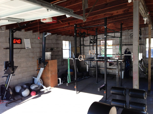 This is a fantastic garage gym - rowers, tmer, rack, ghd.. everything you'd need