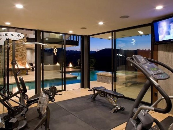 A home gym with a sweet ass view. Very luxurious