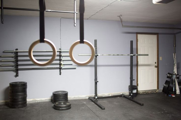 kick ass garage gym with lots of bars
