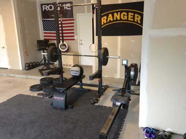 Doesn't this garage gym look kind of staged? Rogue banner in the back, all Rogue gear... hrm