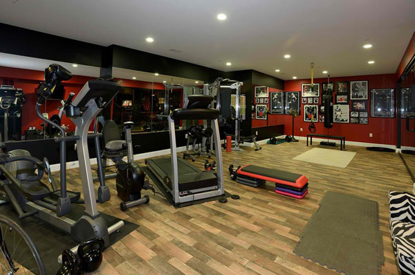 Very nicely equipped basement gym for both lifting and cardio
