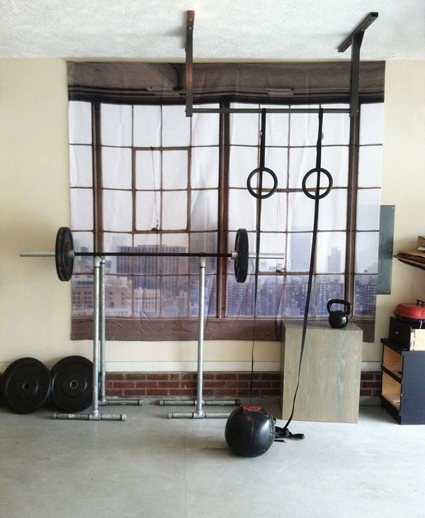 Another DIY home gym. I can't decide if the fake window is tacky or cool. It's kind of a neat idea
