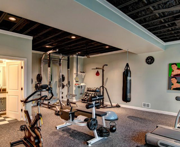 Interesting basement gym - nice ceiling. Lots of really cool gear
