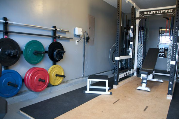 power rack, lifting platform both under and in front of the rack, and crazy clever bar and plate storage