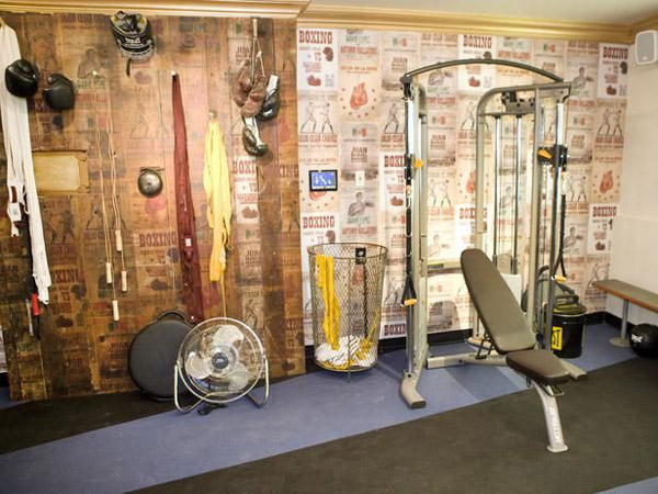 Garage gym with vintage wallpaper