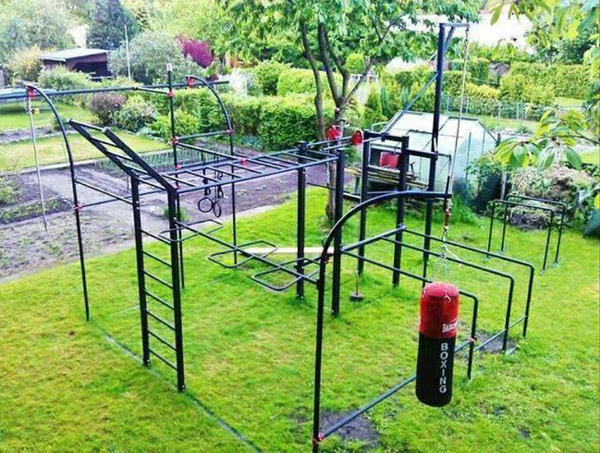 Very elaborate monkey bar set up. Lots of fitness to be performed here out in the sun. Cool
