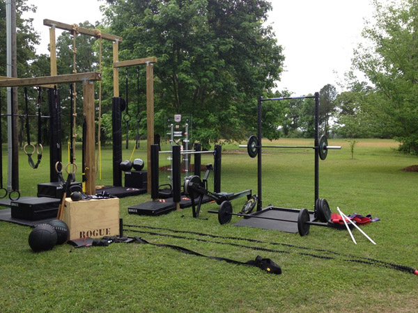 Full blown Rogue outdoor gym. Why it's outdoors, I have no idea, but it sure looks like a lot of fun to work out here
