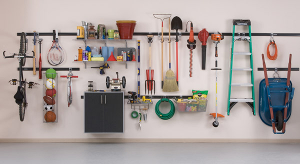 Organize your wall with track hooks like the Rubbermaid Fasttrack