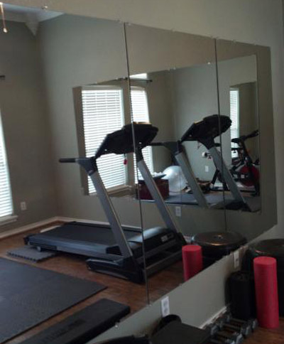 Installing a DIY home gym mirror wall for cheap!  Home gym mirrors, Gym  room at home, Workout room home