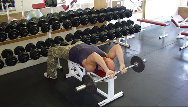 Behind the head lying tricep extension, picture from muscle and strength