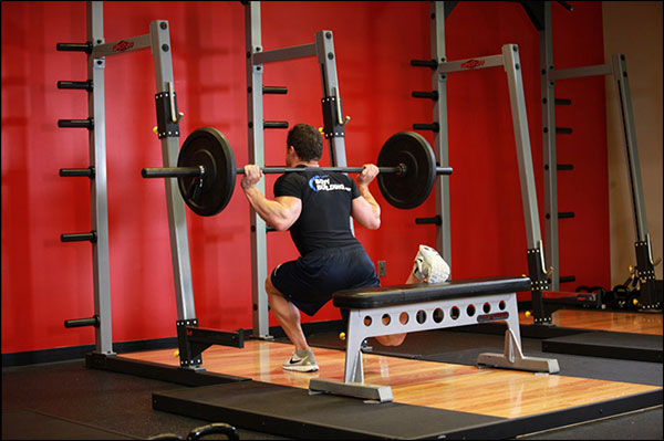 Bottom position of the Bulgarian Split Squat (one legged barbell squat) - image courtesy of bodybuilding.com