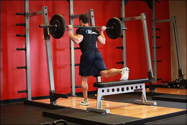 Starting position of the Bulgarian Split Squat (one legged barbell squat) - image courtesy of bodybuilding.com