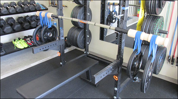 Loading Vulcan's Quad Grip Plates on the Bandbell SuperQuake instead of kettlebells