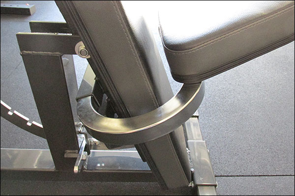 Seat installs behind the back pad using a U-shaped, wrap-around steel tube