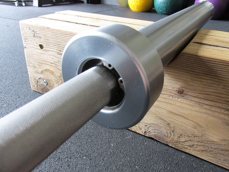 American Barbell Stainless Steel Olympic Bearing Bar inner dust sleeve