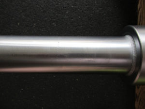 American Barbell SS Oly Bar minor sleeve damage over time close up