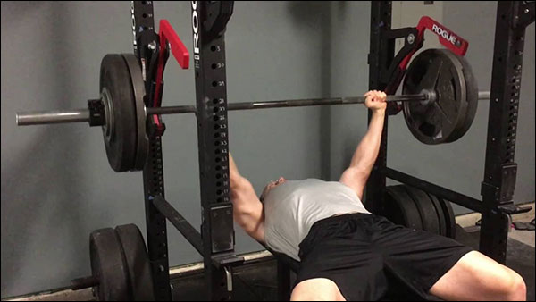 Using the Rogue Monolift Attachment for the bench press eliminates the lift off