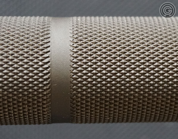 Rep Fitness PowerSpeed Bar knurling close-up