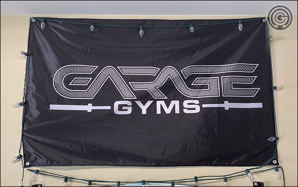 The Garage Gyms gym banner with a knurled design is now available for purchase at the Garage Gyms Store