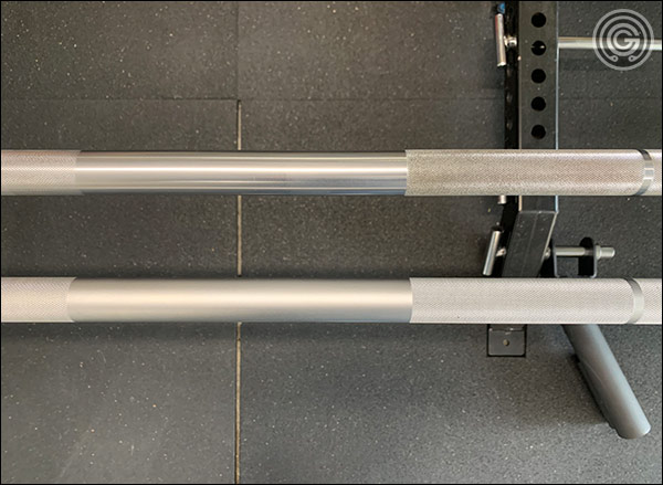 Like the Matt Chan Bar (top), the Hybrid Bar has the start points of the outer knurling set further out (to protect the shins.) The distance between these two starting points is the same on both bars; 21".